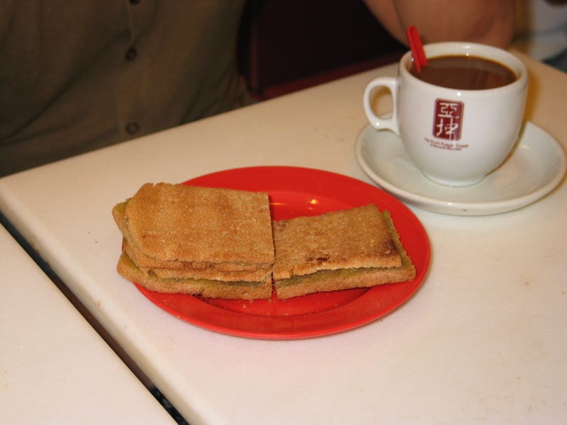 Kaya toast and kopi, a Singaporean breakfast staple.