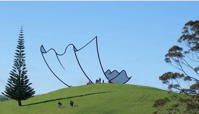 A cartoon-like sculpture made of welded steel in New Zealand