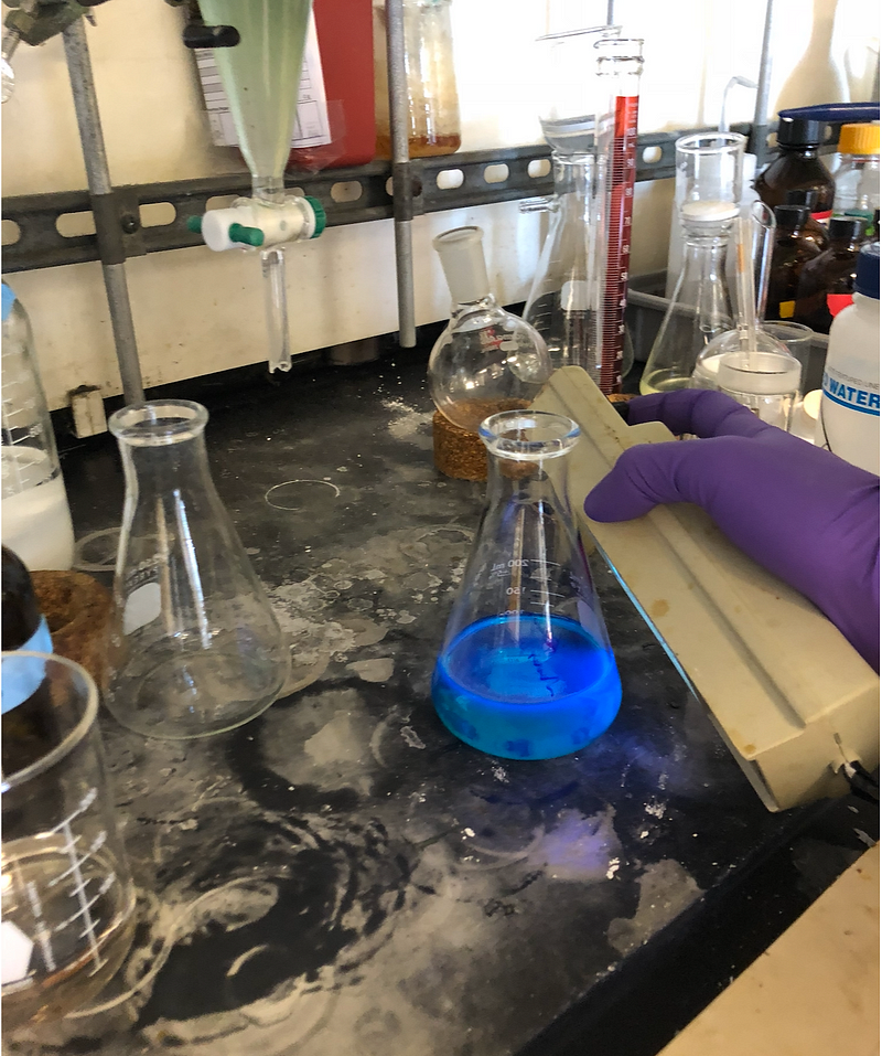 Fluorescing silicon rhodamine solution under UV light