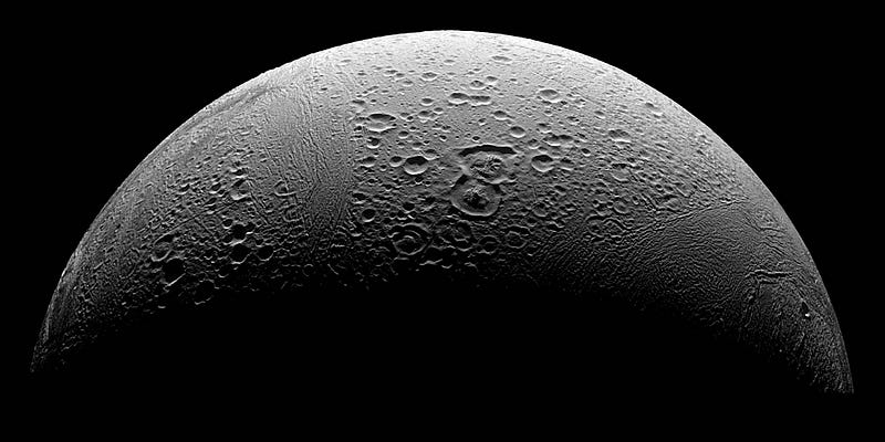 A captivating view of Enceladus and its icy surface